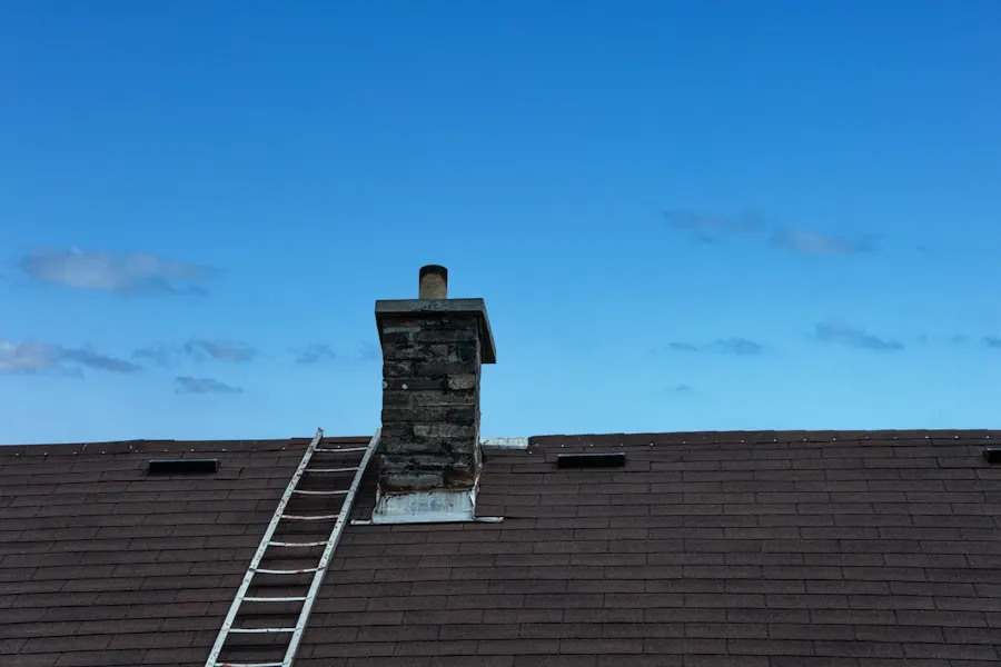 Ladder set against a shingle roof for chimney work